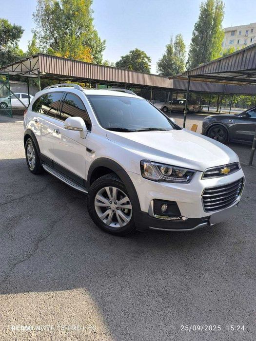 Chevrolet Captiva 3/4 — белый жемчуг