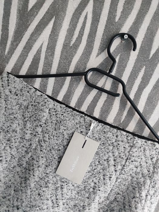 Пола In Wear вълна