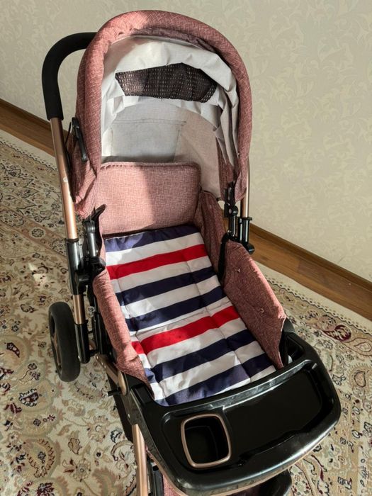 Детская прогулочная коляска