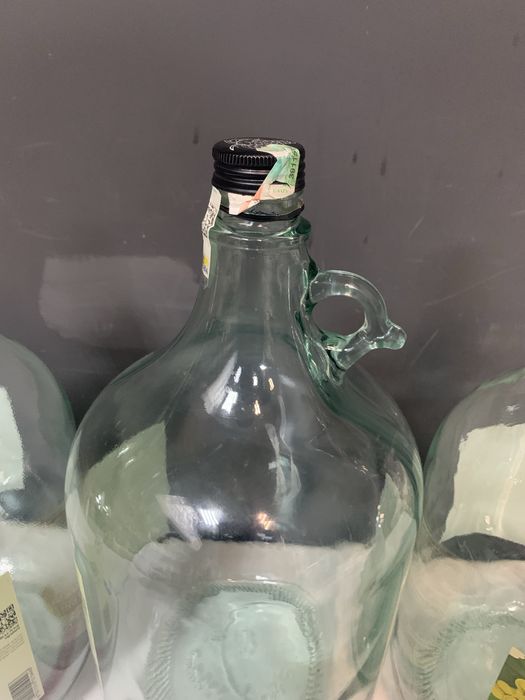 Продам стеклянные бутылки 5л