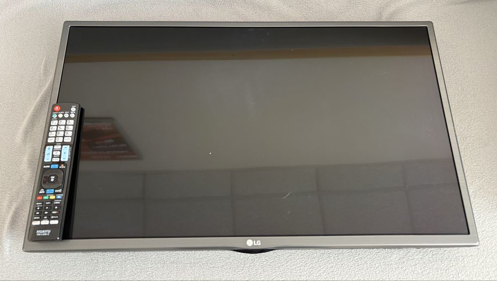 Телевизор LG б/у………….