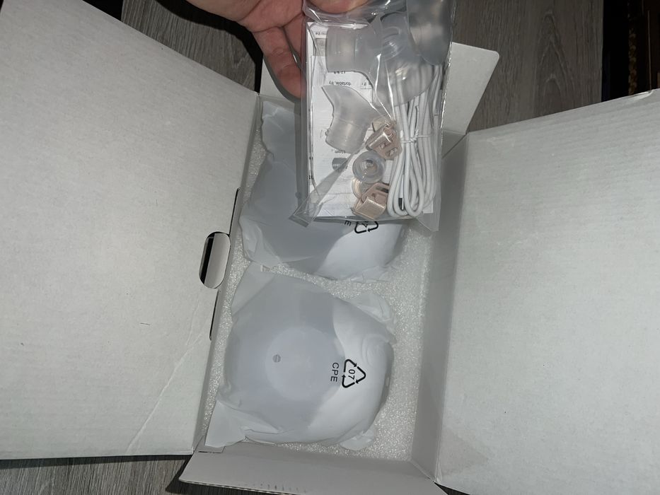 Электрический молокоотсос  новый