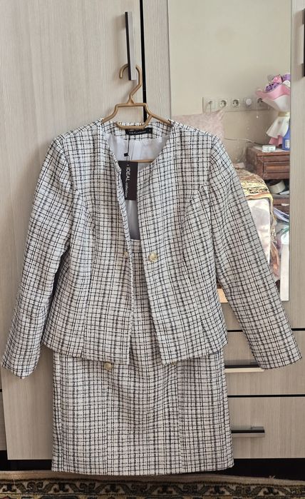 Продам новый женский костюм-двойку