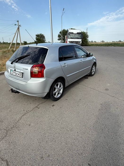 Тойота каролла 2003