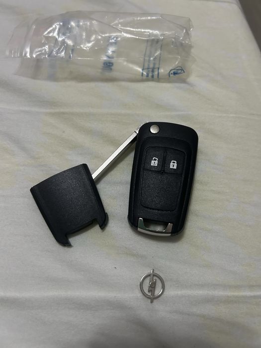 Cheie tip briceag 2 butoane opel astra j corsa e insinginia