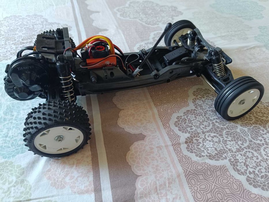 Radiomodel asamblat Tamiya #58587 DT-03 „Neo fighter buggy” (fără electronice)