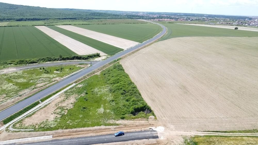 Teren 1483 mp cu (hală) de 383 mp la 50 m de noul inel metropolitan