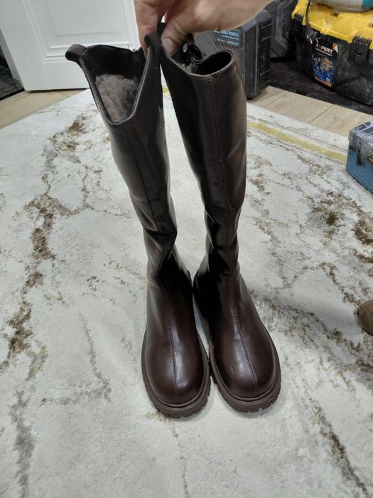 Продам сапоги новый