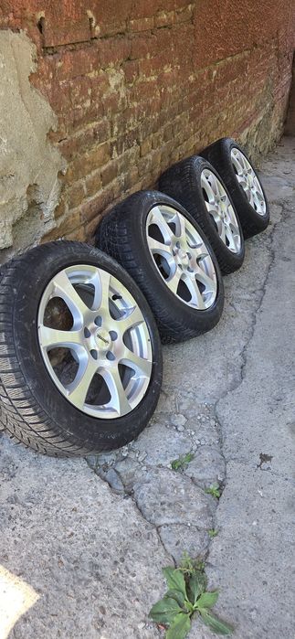 OPEL джанти със зимни гуми 195/55/16 7J ET35 5x110 цо65,1