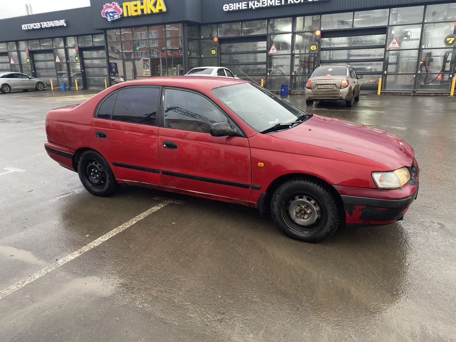 Тойота Carina e