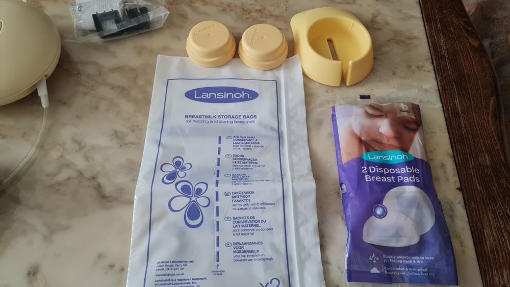 Електрическа помпа за кърма Medela Swing със зарядно (без шишета)