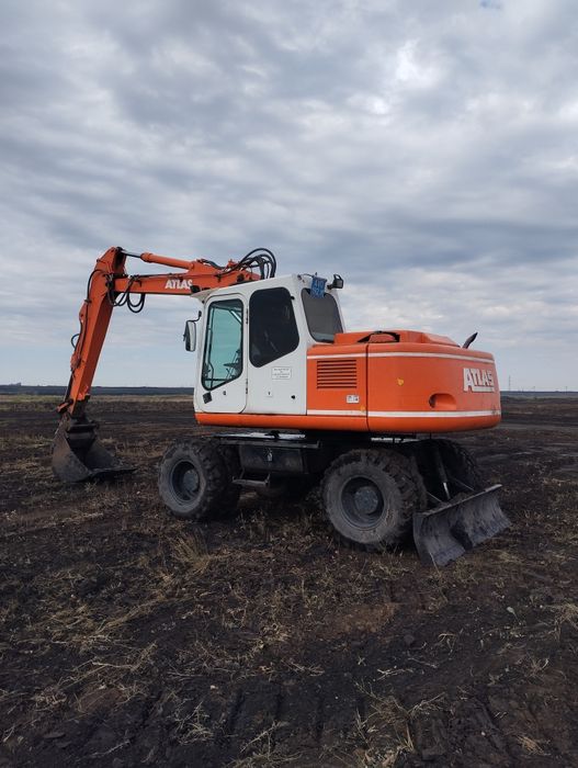 Колёсный экскаватор