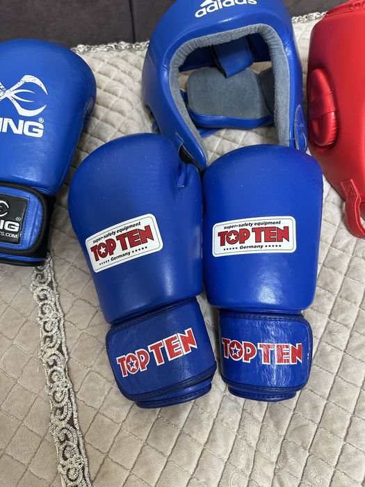 Шлема и перчатки боксерские