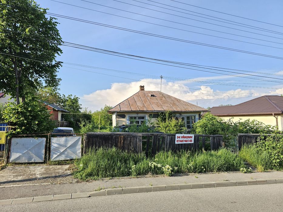 Vând casa si teren 1000mp