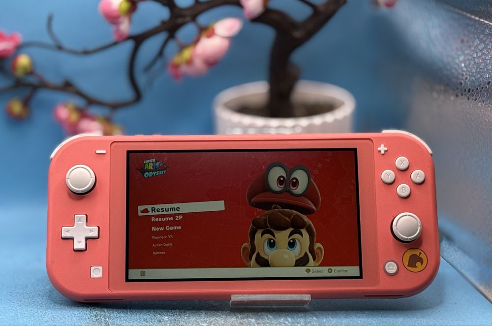 Nintendo Switch Lite (Animal Crossing Edition) + Super Mario Odyssey