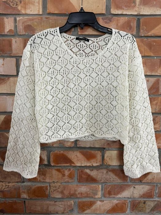 Женские свитеры и кофты