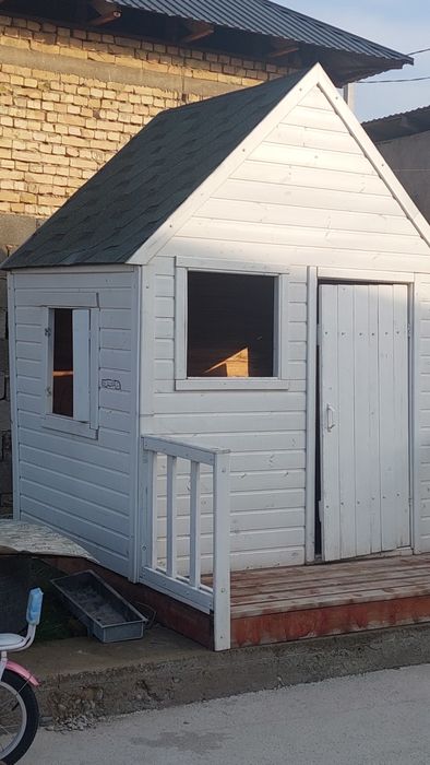 Деревянный детский домик