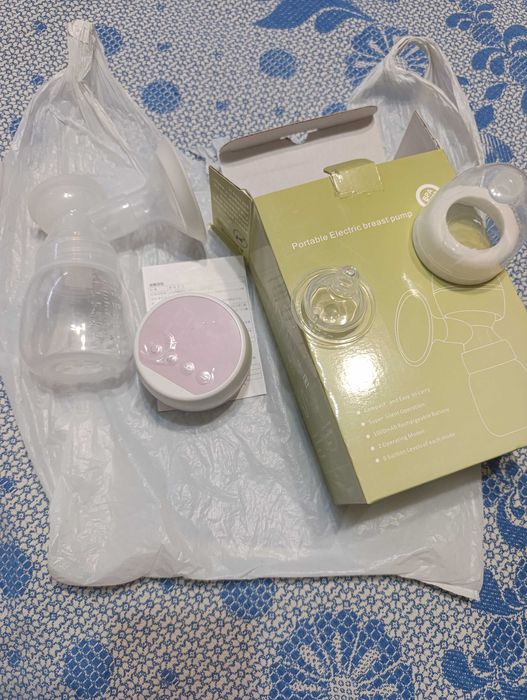 Электрический молокоотсос б/у