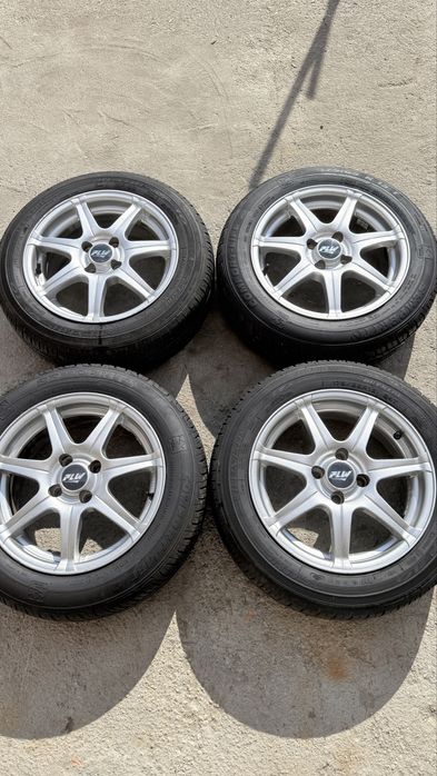 Джанти с гуми за хонда опел фолксваген 4х100 15”