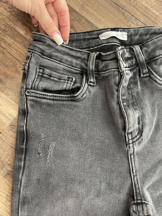 Еластични дънки с висока талия