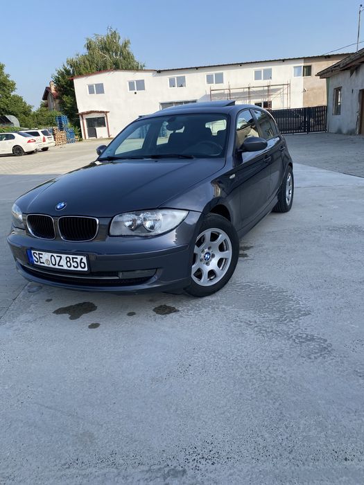 Vand bmw seria 1/navi/trapa /senzori parcare/comenzi volan