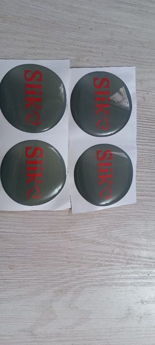 Наклейки на центральный колпачек Slik