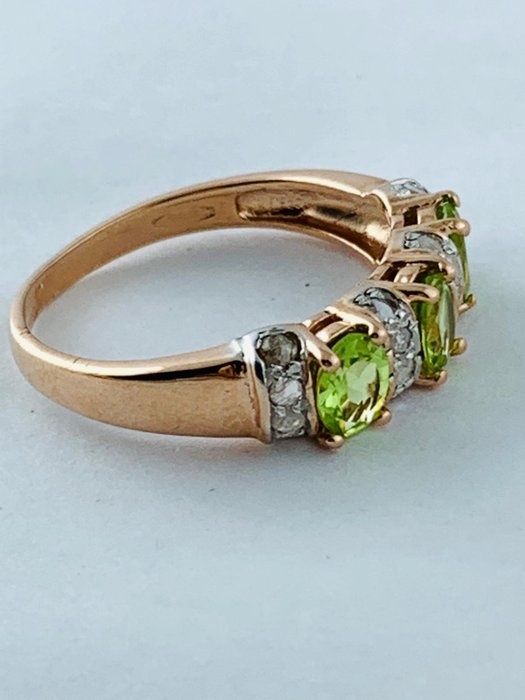 Redus  Inel aur 14 kcu peridot și diamante