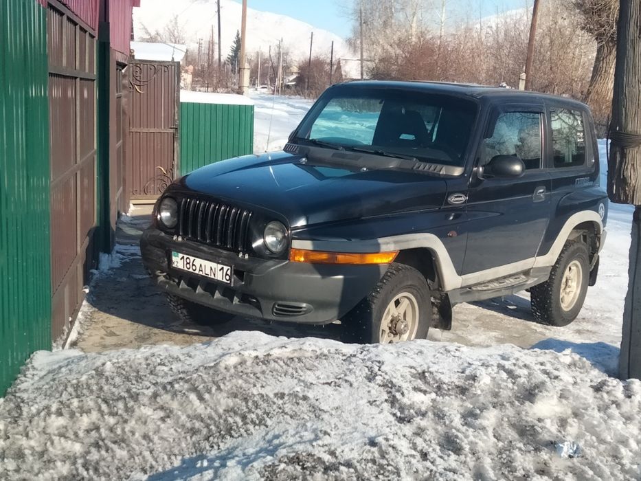 Автомобиль Санг Енг Корандо