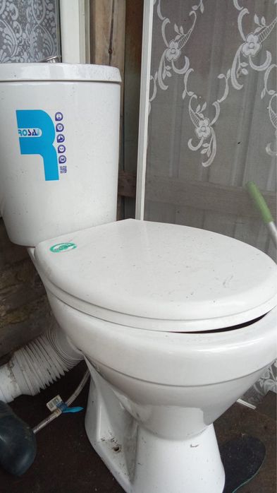 Продам унитаз бачок керамический как новый