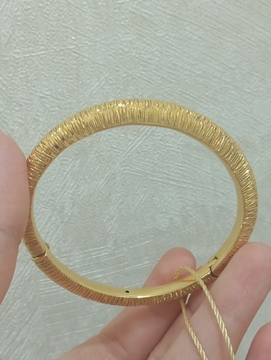 Золотой браслет от Марко Жаванни