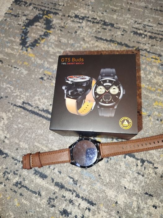 Продам часы с встроенными наушниками