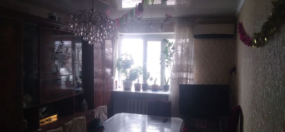 Үш бөлмелі пәтер.