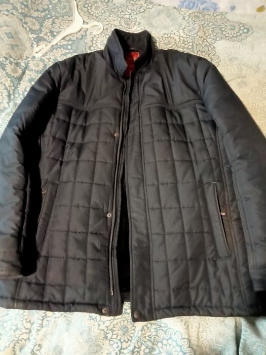 Отдам пуховик мужской.