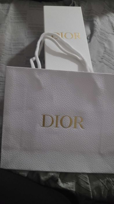 Стъклена бутилка с кожен калъф Dior