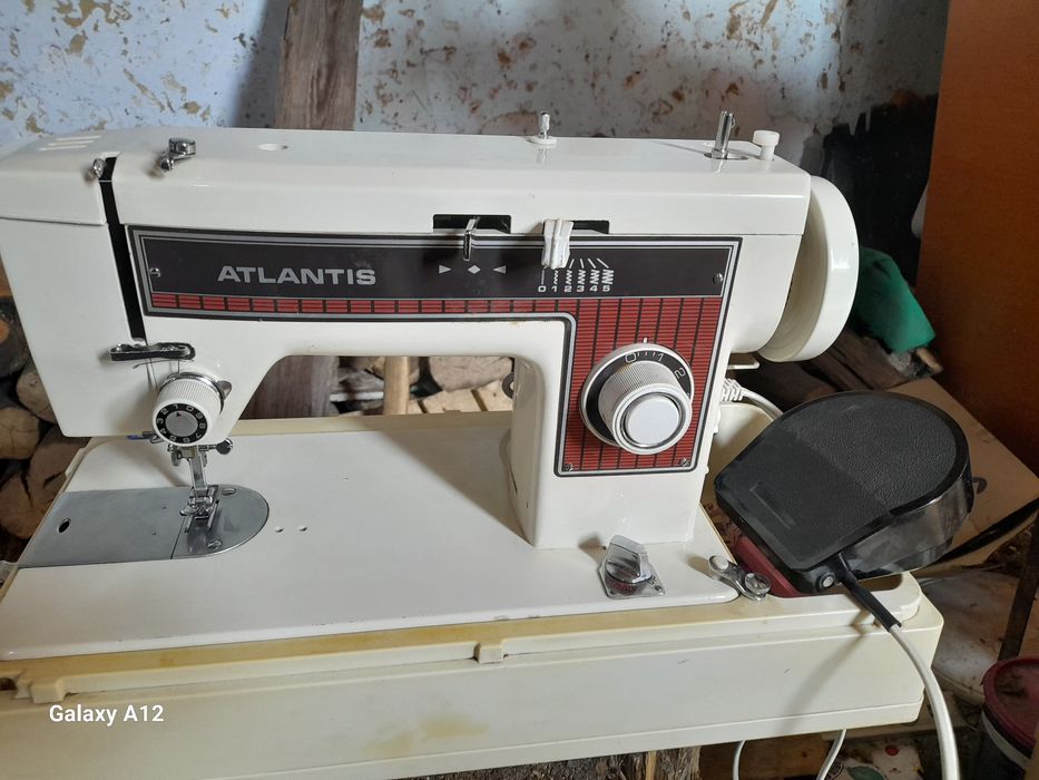 Vand sau schimb masina de cusut Atlantis