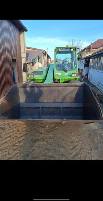 Incărcător telescopic