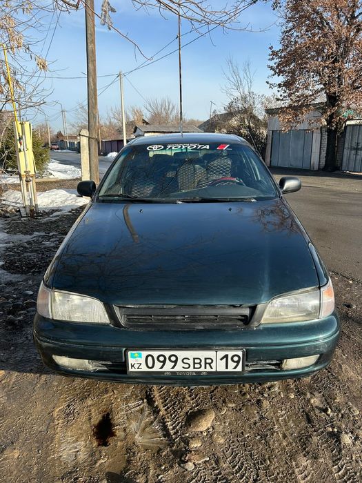 Тайота каринаа Е