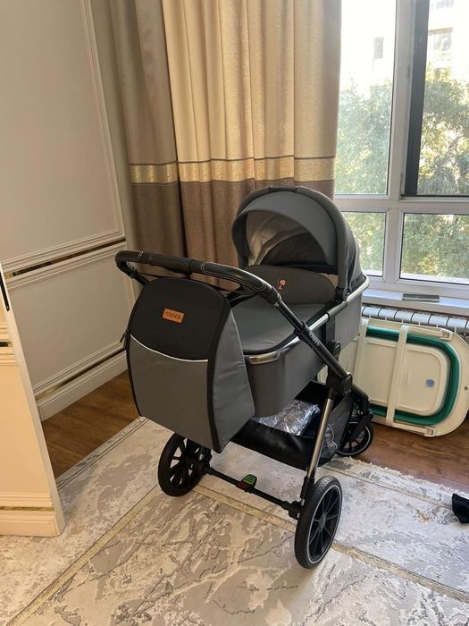 Детская коляска универсальная