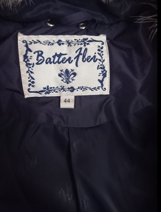 Продам пуховик с чернобуркой