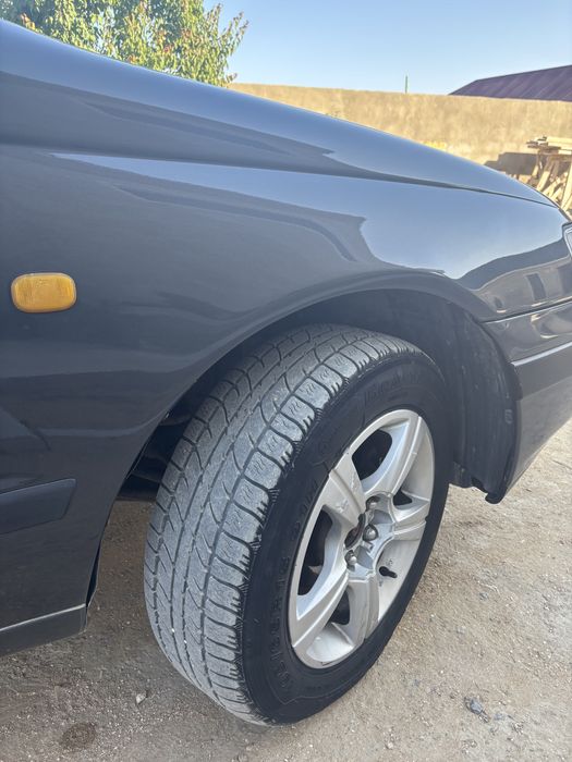 Тойота карина Е