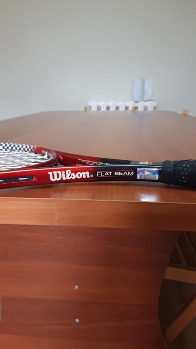 Теннисная ракетка