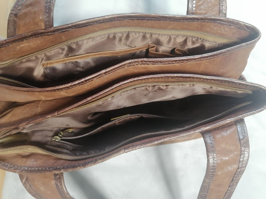 Коженная сумка коричнего цвета