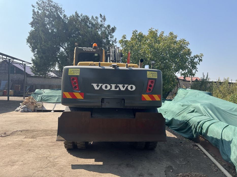 Услуга экскаватора Волва 145 с траншея  ковши гидромолотом