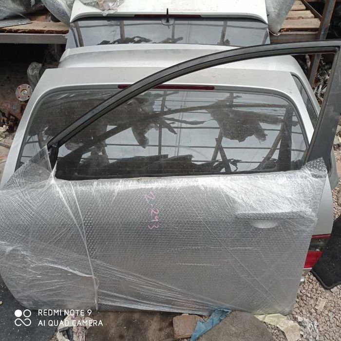 Дверь Nissan Primera QP12