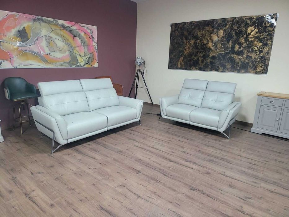 Светло сив комплект кожени дивани двойка и тройка Loreto с ел. релакс