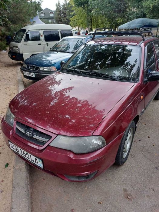 нексия2 гибрид  2009г. красный спайкл,