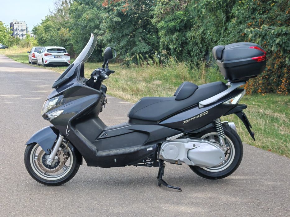 Maxiscuter Kymco xciting 500, 2007, 910 km reali, motor ținut în showroom Kymco Ploiești, 500cm, impecabil, anvelope noi, curea noua, înscris, itp