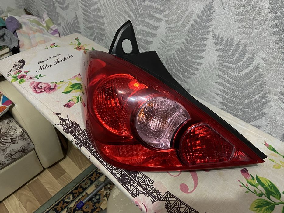 Продам задний левый фонарь тиида