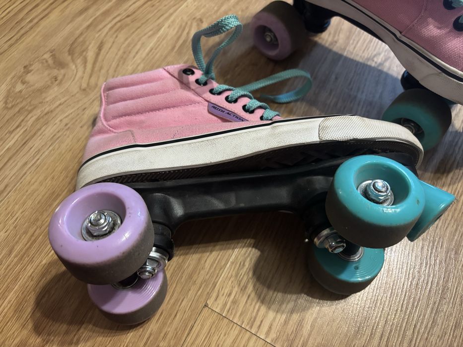 Роликовые коньки