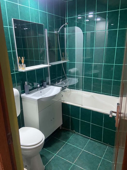 Apartament de inchiriat zona centrala cu loc de parcare . Str General Christin tell